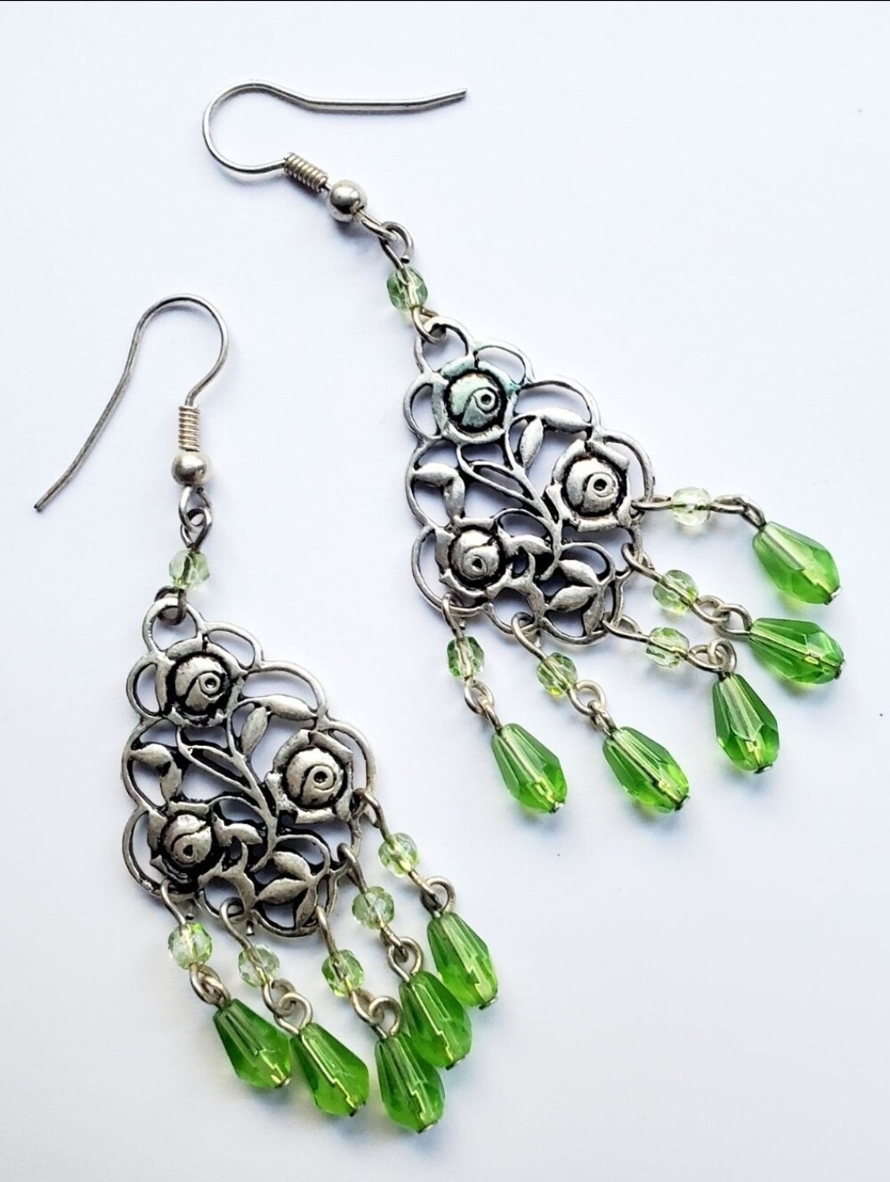 Rose printed meral with green stones. New, no tag. Never worn.